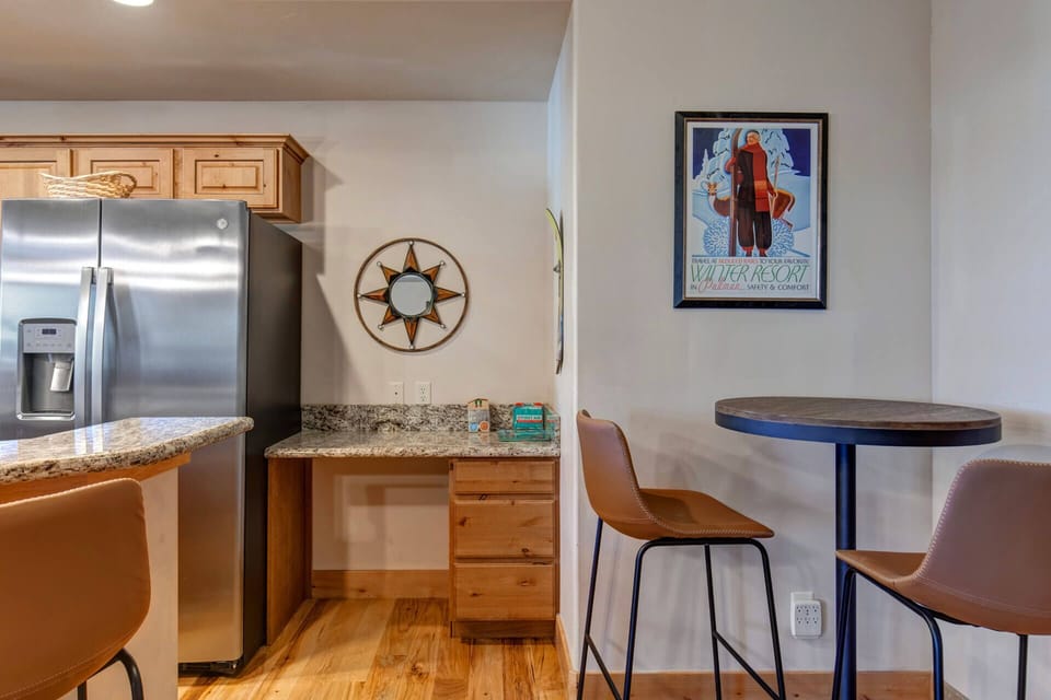Your fully equipped kitchen features granite counters, stainless appliances, and a cozy breakfast nook perfect for morning coffee.