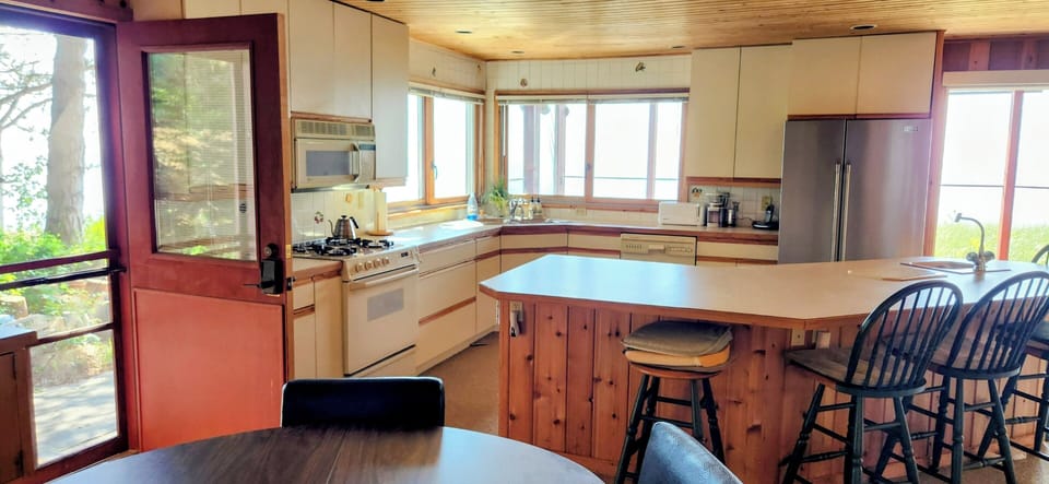 Front door into kitchen and dining area.