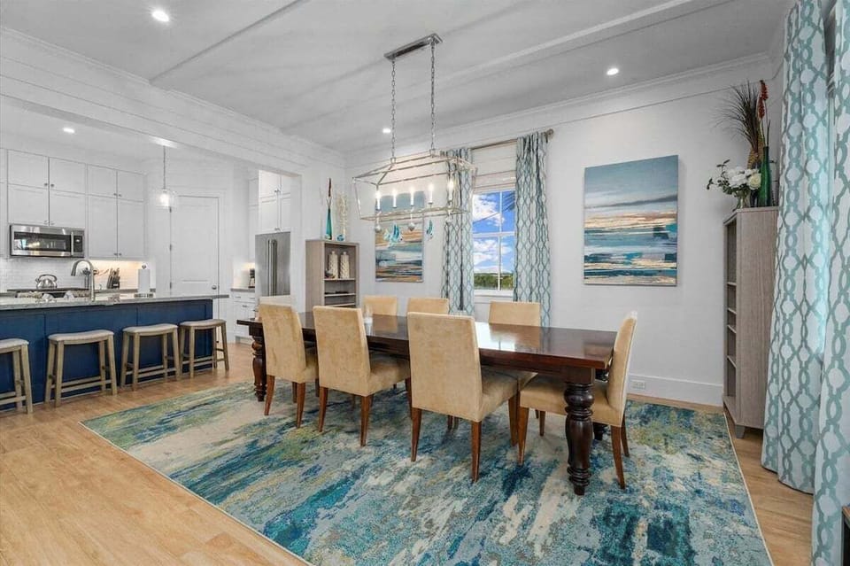 Open dining and living area with spacious seating arrangements and easy flow for entertaining family and friends.