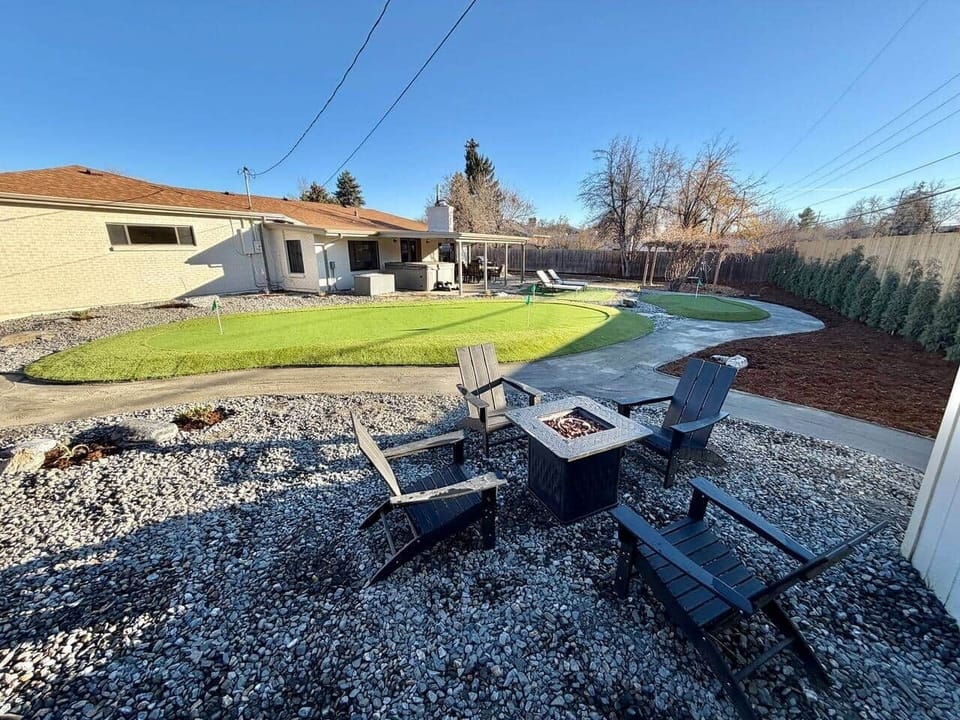 Propane Firepit with view of two putting greens