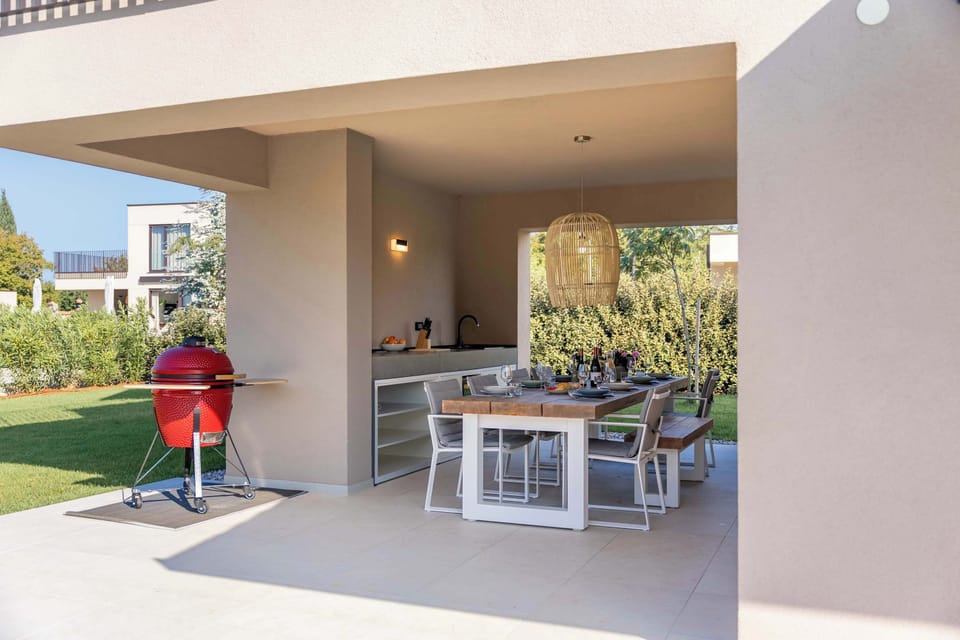 Outdoor dining area with barbecue