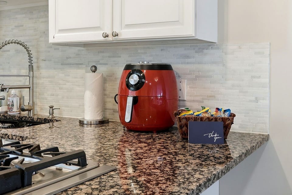 Nook and prep area designed for convenience and everyday comfort. (includes air fryer and snacks)