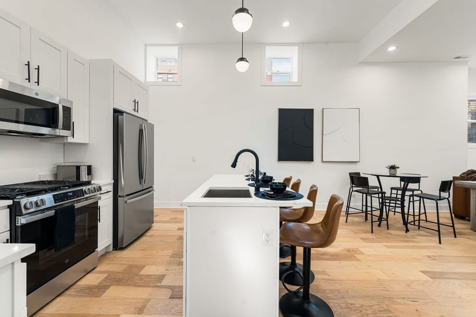 Modern kitchen island perfect for shared meals & conversation.