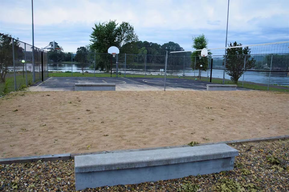 Sandy area for volleyball or the like. Pickleball. We have equipment. 