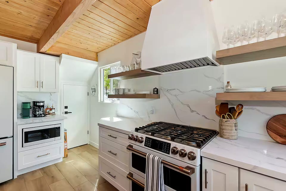 Entertain in our remodeled kitchen with GE Café appliances and coffee bar.