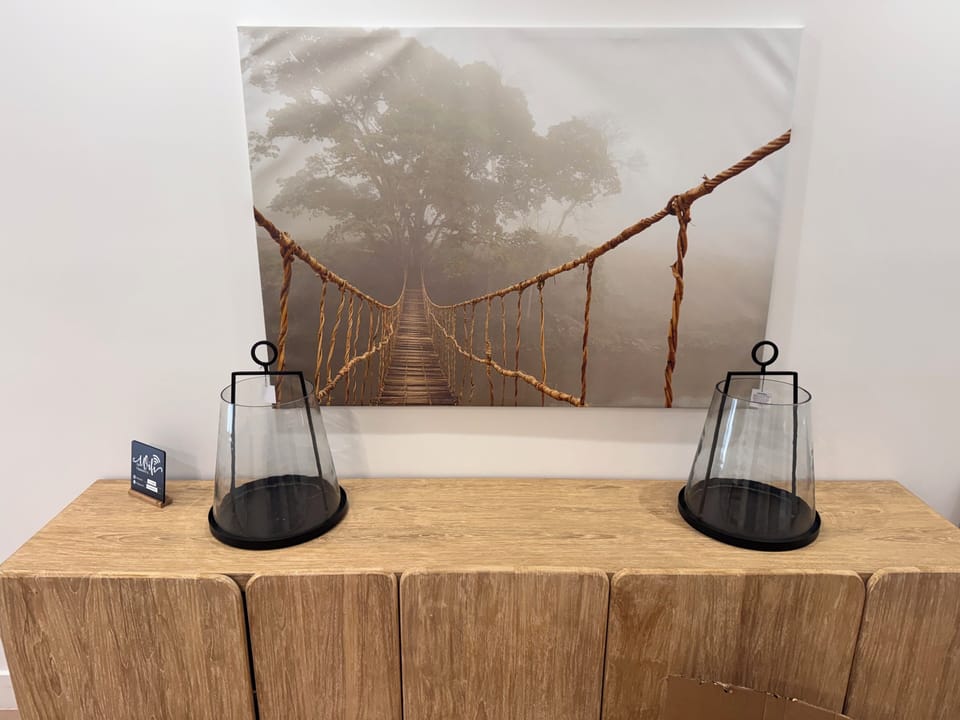 The entrance hall welcomes you with Wi-Fi instructions and a storage console