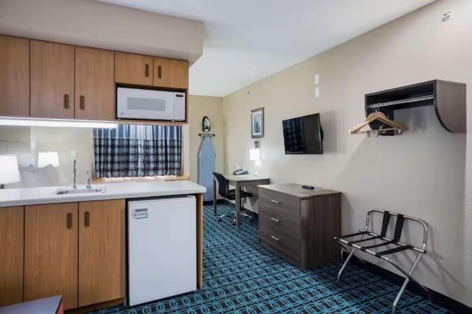 Sip morning coffee with an easy kitchenette setup nearby.
