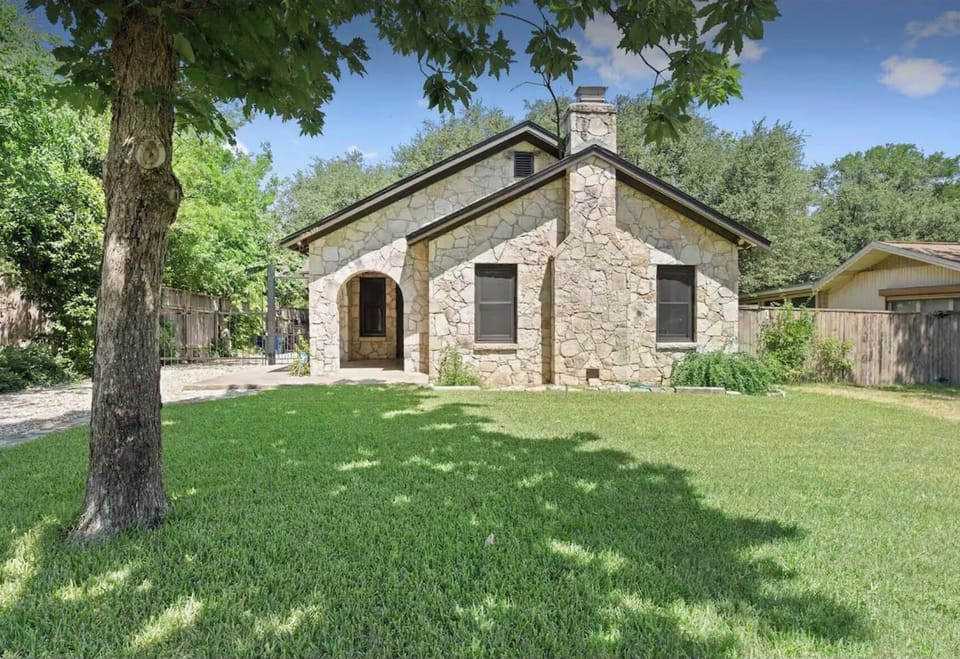 Beautiful classic stone home on expensive private lot.  Heart of South Congress.