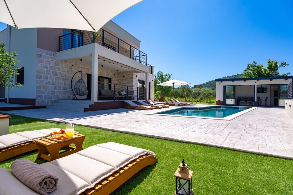Enjoy the pool area at this stylish home away from home near the Adriatic coast.