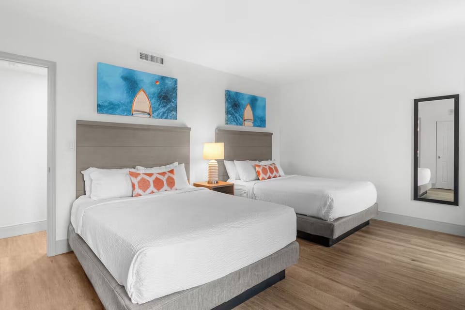 Settle into crisp linens with two beds for easy sharing.