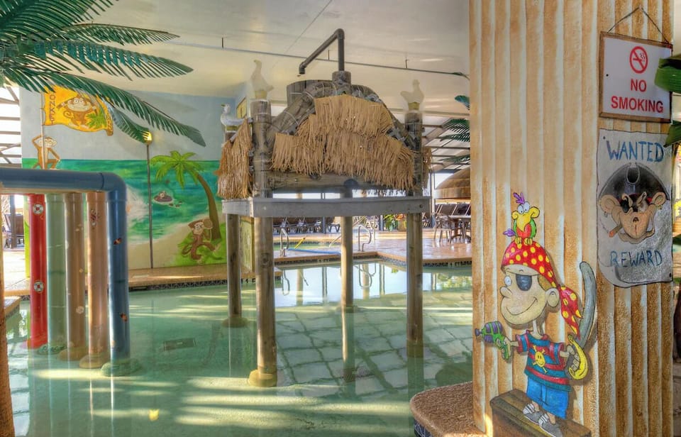 Let kids splash safely in the playful indoor water zone.