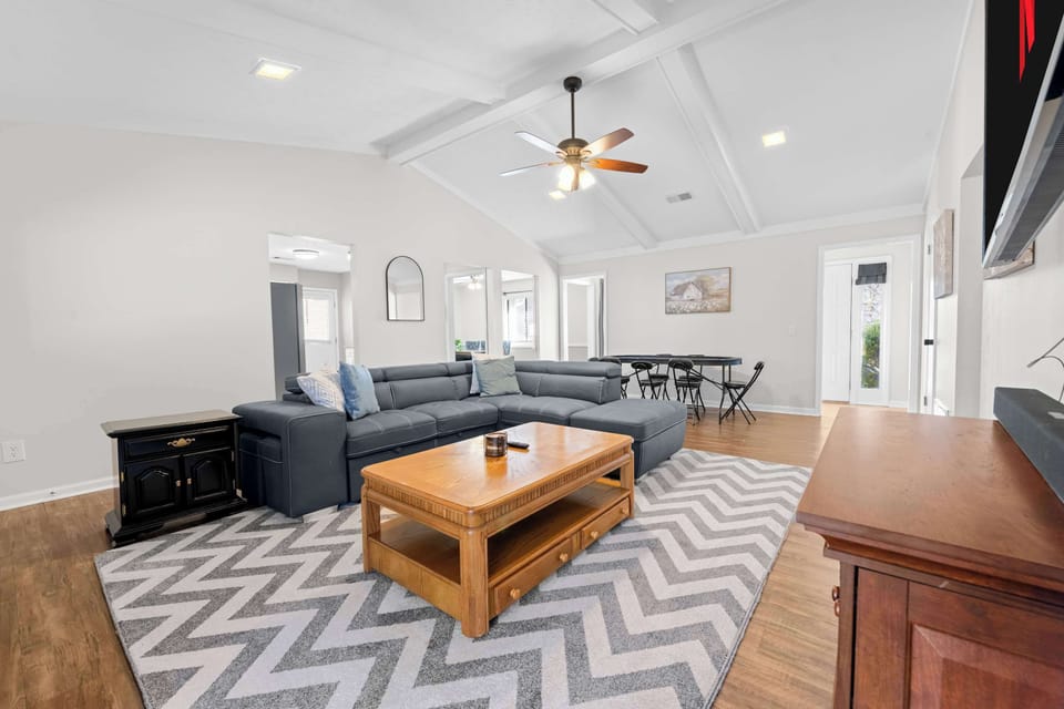 Modern living space with bright natural light and open layout
