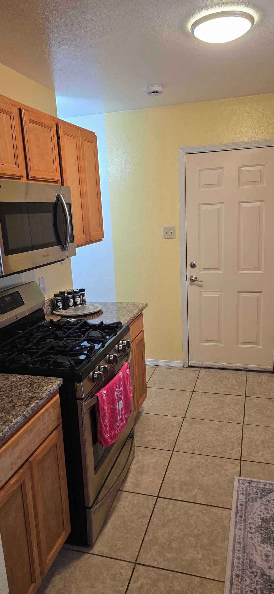 Microwave, stove, and oven.