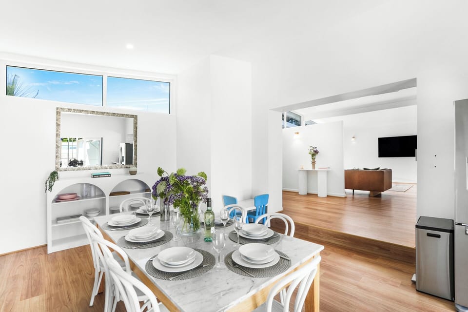 Stylish dining space with natural light and modern decor