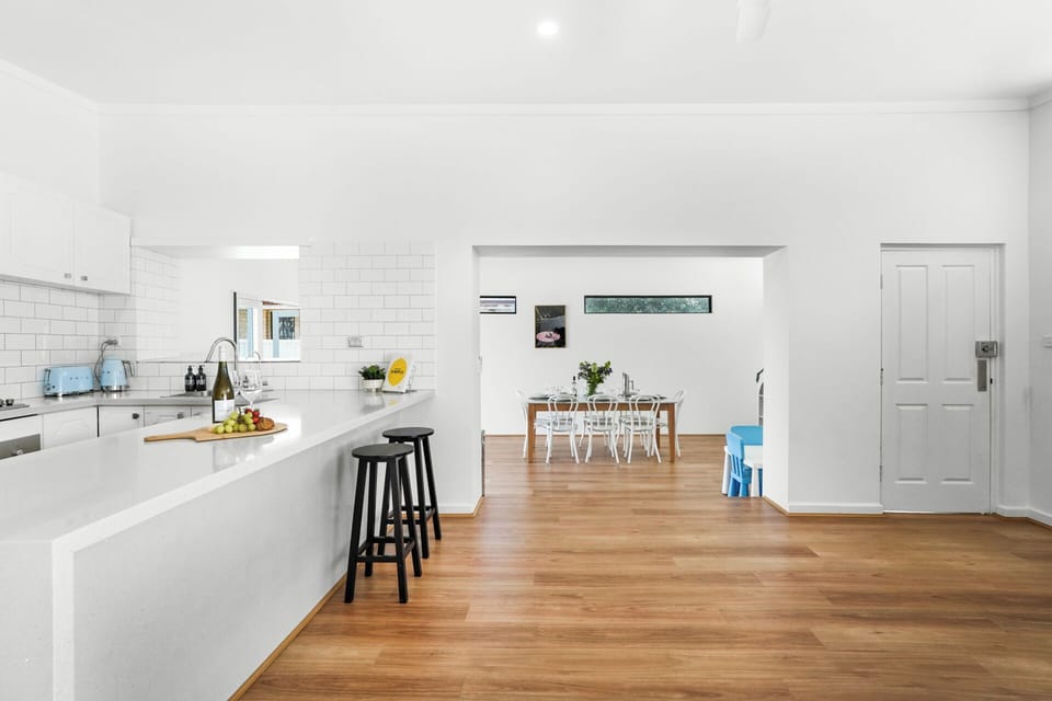 Bright, spacious flow from kitchen to dining area