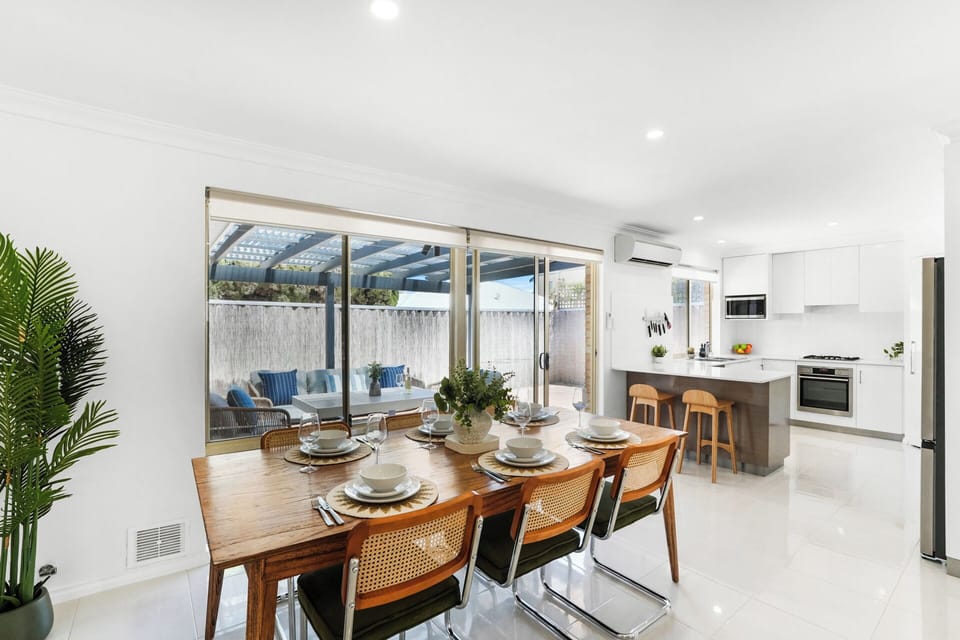 Enjoy indoor dining with a view of the outdoor lounge