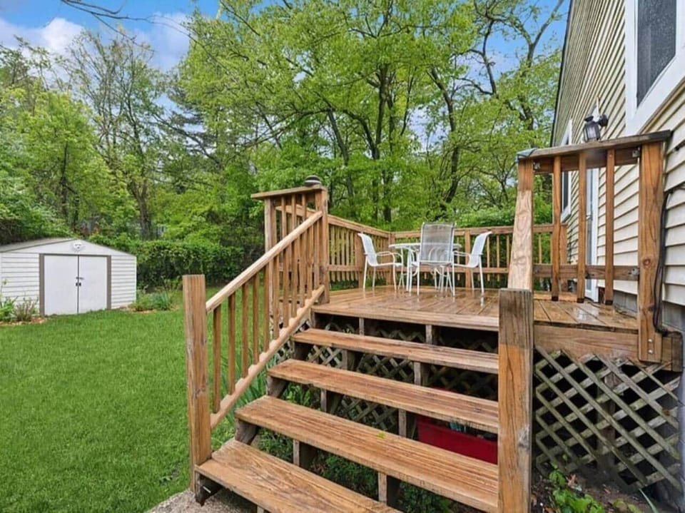 Back deck and yard, perfect for dining our doors.