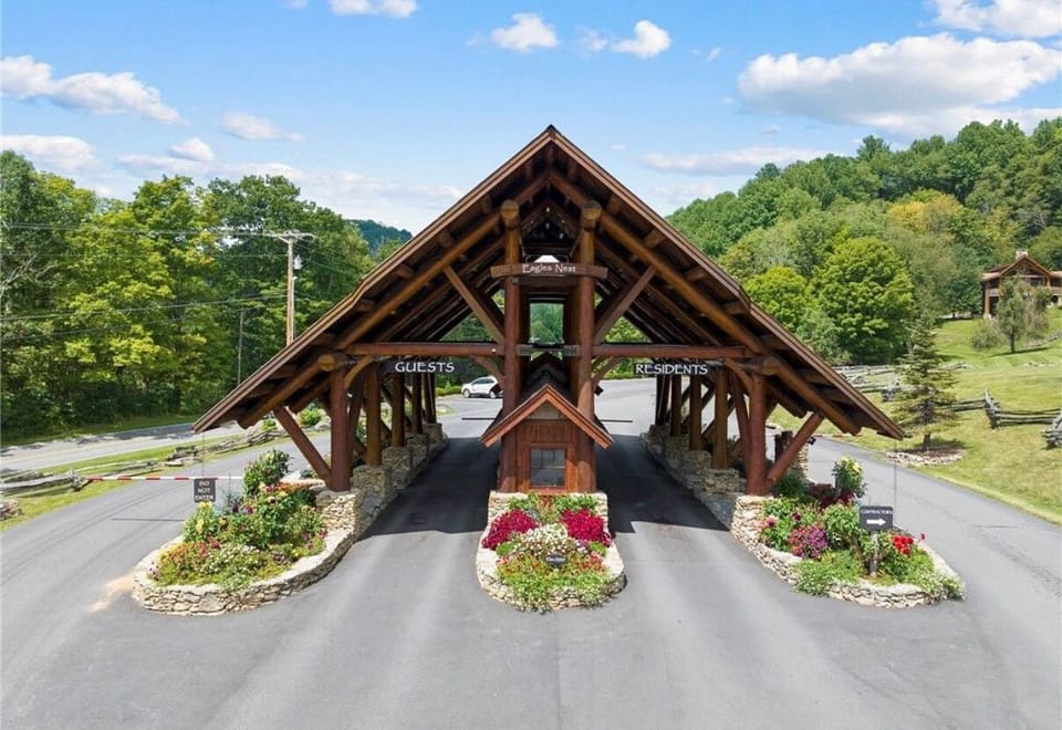 Arrive in style through this stunning covered entrance, designed like a mountain resort lodge, making every arrival feel special whether you’re checking in or heading out for the day.