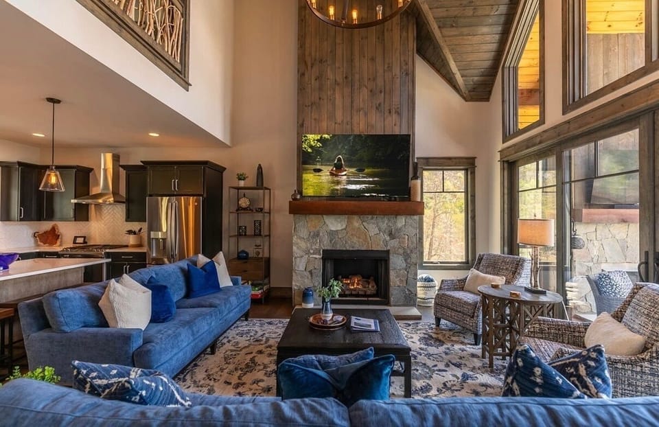 Cozy evenings start here. Curl up by the fire, watch the sunset through towering windows, and relax into plush sofas where every moment feels warm, inviting, and wonderfully unhurried.