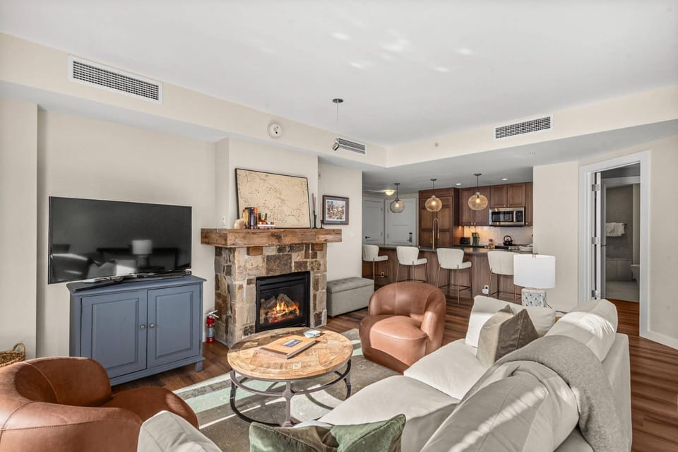 The living room and open kitchen are perfect for relaxing after skiing or hiking in Snowmass