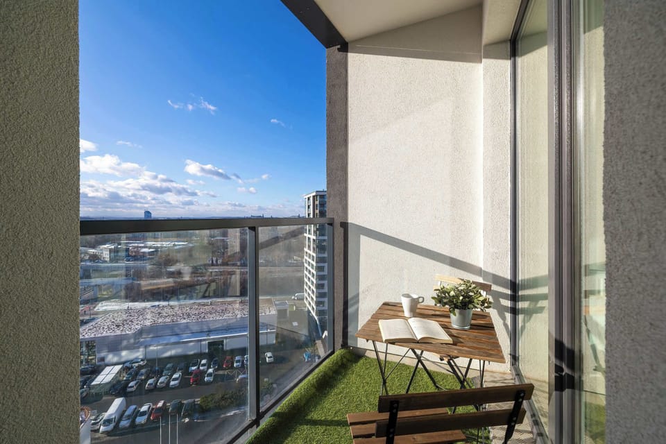 The balcony provides a perfect spot for enjoying the fresh air.