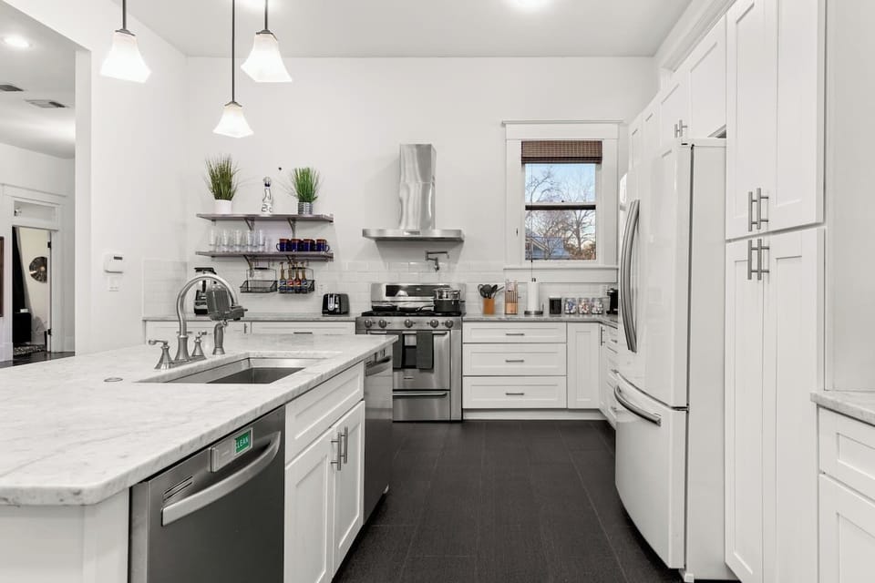 Savor the modern elegance of our bright and airy kitchen, where every appliance and amenity beckons you to cook with joy.