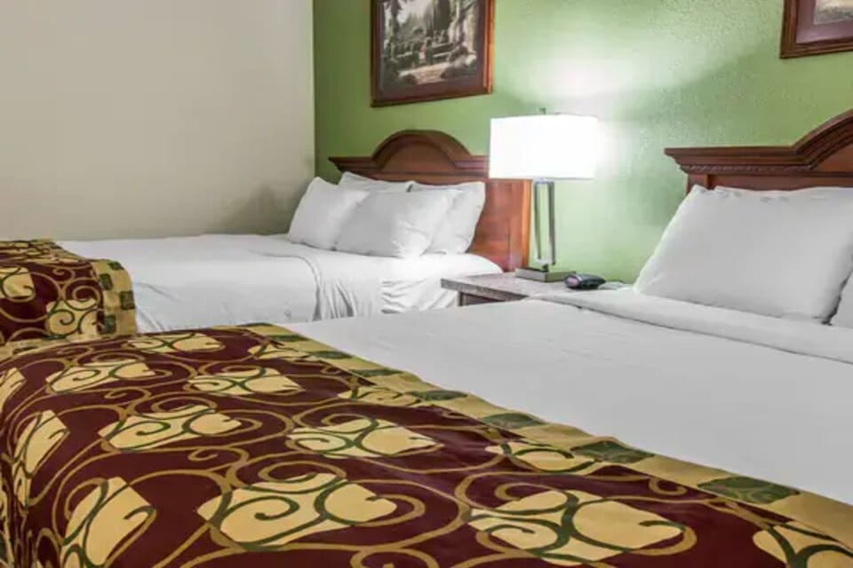 Recharge beside soft bedside lighting for a restful night.
