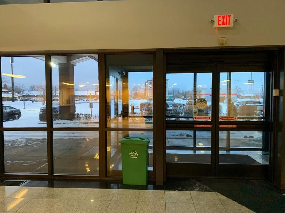 Arrive effortlessly through bright, secure lobby entry doors.