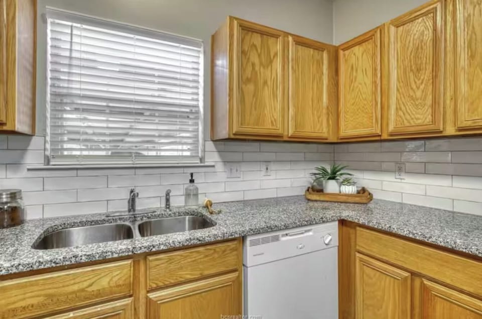 Double sink, dishwasher. Both drip coffee maker and Keurig for morning coffee .