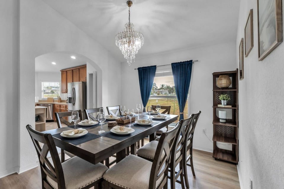 Comfortable dining space with natural light with seating for eight