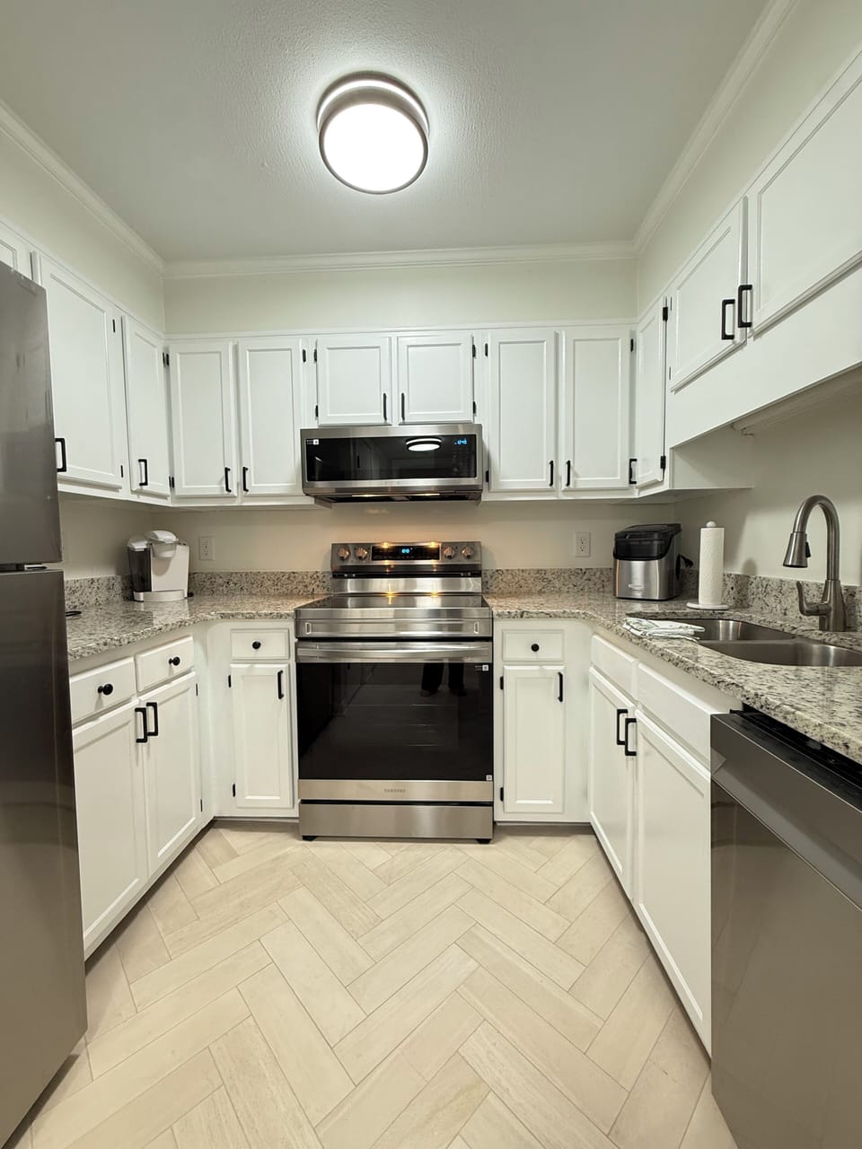 Kitchen with adjacent laundry room 
