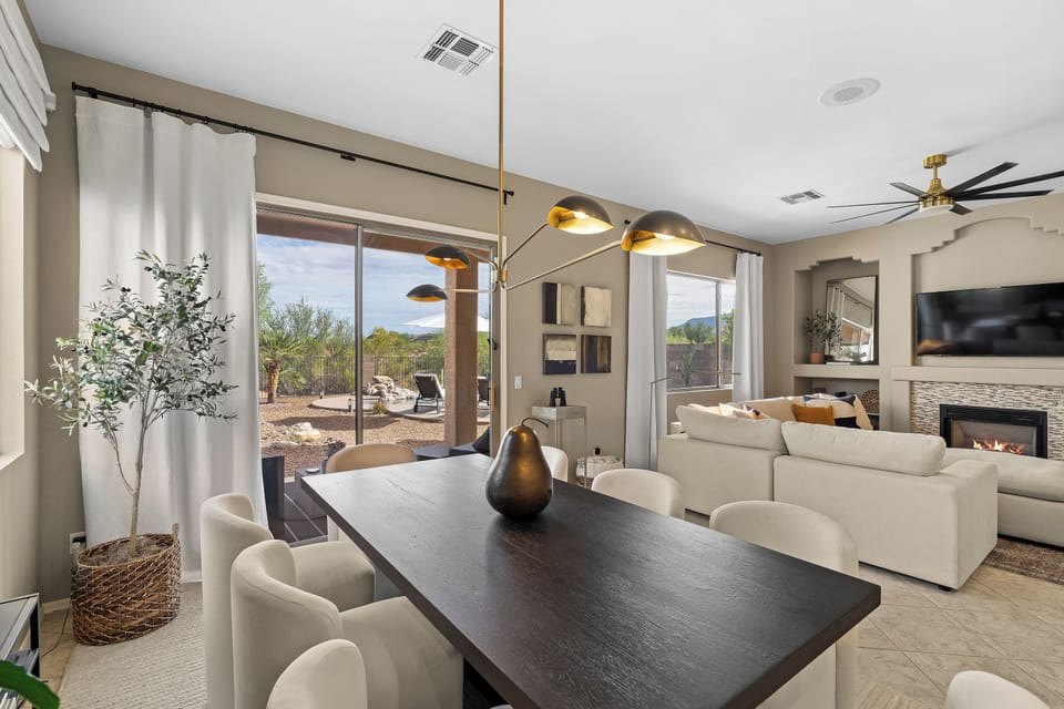 Gather comfortably around a beautiful RH table with swivel chairs 