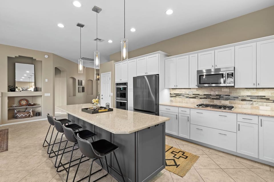 Generous kitchen featuring a large island - perfect for cooking & gathering