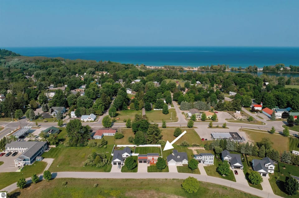 Drone view of Sunset House. Walk to Empire Beach on Lake Michigan