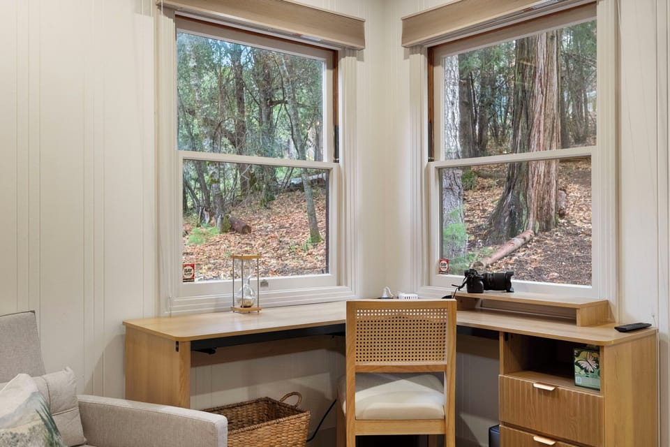 Work/office area facing the forest in the master bedroom. Cabin has high speed internet.