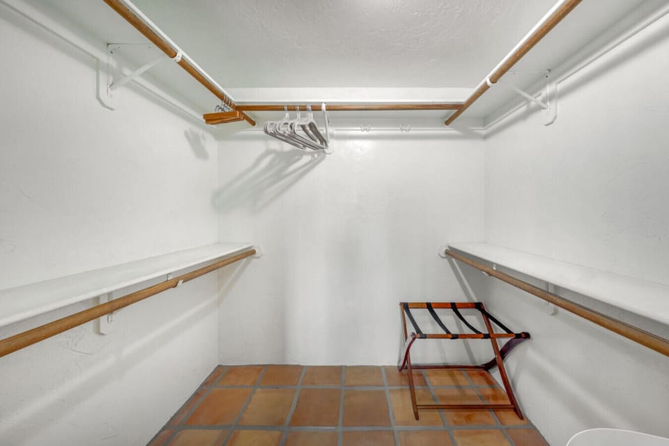 Primary bedroom`s spacious walk-in closet