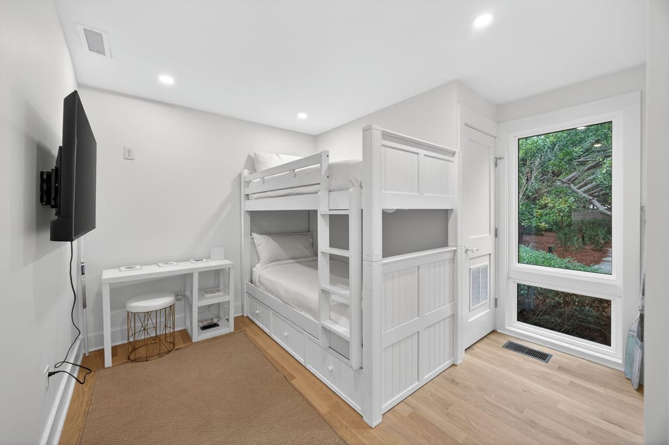 Bedroom 4: Bunk Bed with Two Twin XLs, TV, Private Bathroom