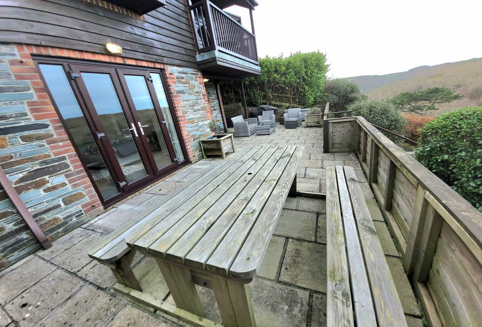 Langunnett Cottage, Looe: Terrace with beautiful views over the countryside, Looe estuary and woodlands