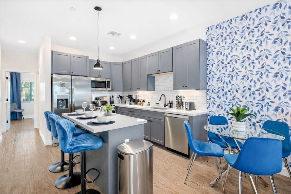 Expansive open layout where the kitchen, dining, and living spaces flow together.
