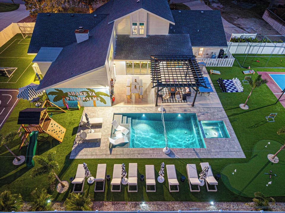 Outdoor Paradise: Dive into relaxation by the sparkling pool and enjoy fun-filled games!