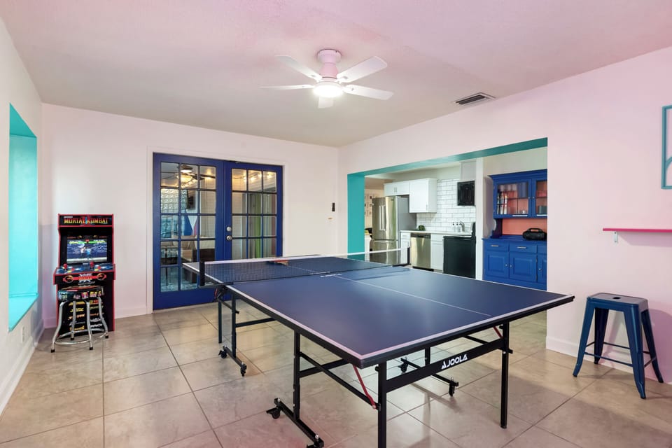 A bright, open game room just steps from the kitchen.