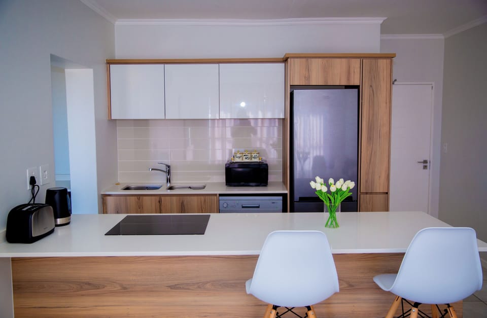 kitchen,fully stocked with all your cooking  utensils 