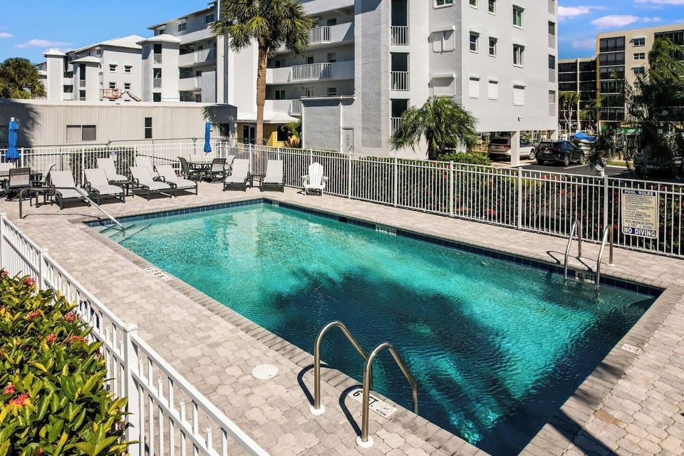 Resort-style pool perfect for cooling off after a beach day or lounging under the Florida sun.