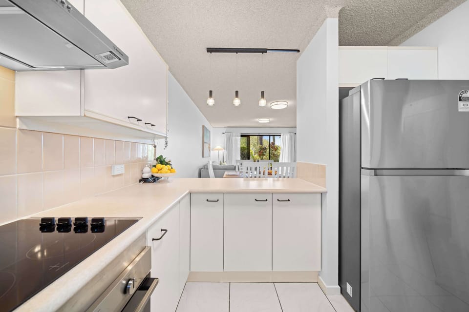 Kitchen designed to connect seamlessly with living spaces.