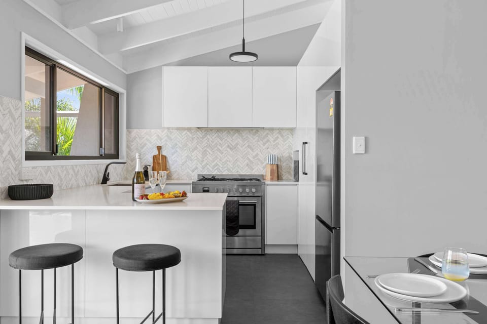 Sleek modern kitchen with quality appliances.