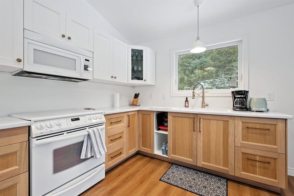 Thoughtfully designed kitchen featuring clean finishes, modern appliances, and everything you need for a comfortable stay.