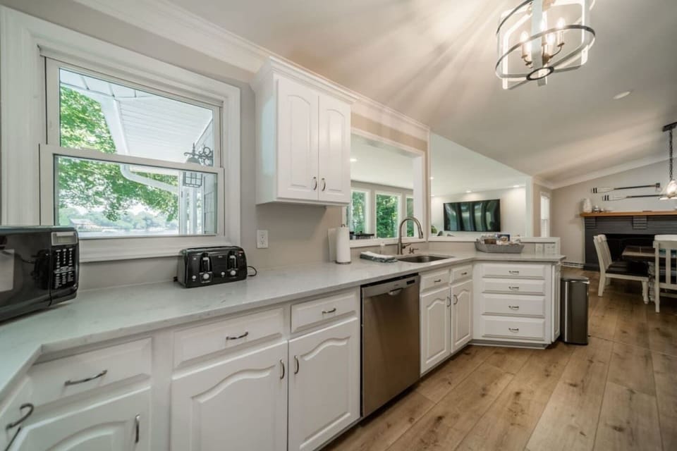 Kitchen: Includes a variety of small appliances like toaster, microwave, blender, etc.