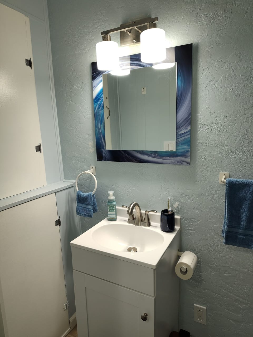 Half bath mirror and sink