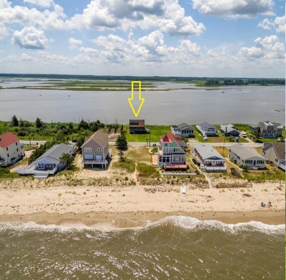 Direct beach access with unobstructed views of the beach.