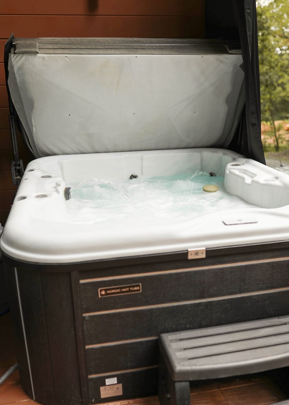 Hot Tub (located on the porch)